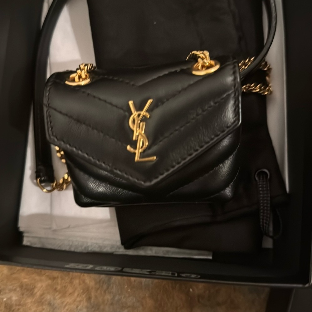 Yves Saint Laurent Black and Gold apple AirPods case holder bag